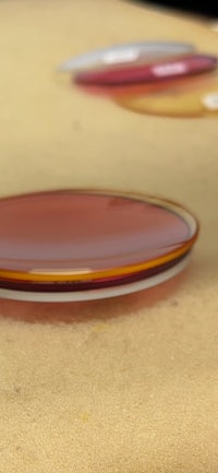 a group of different colored circles on a table