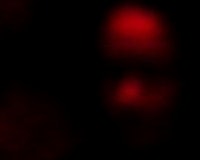 a blurry image of a person in a dark room