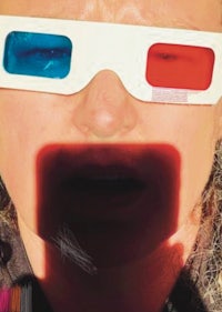 a woman with 3d glasses on her face