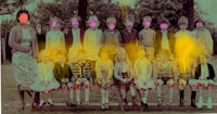 a group of children posing for a photo metal print