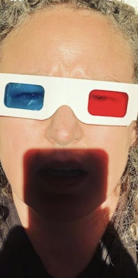 3d glasses on a woman's face