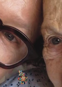 two elderly women with glasses are posing for a photo